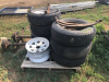 Pallet of trailer tires axles rims