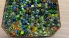 TIN OF MARBLES - 3