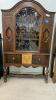 ANTIQUE CHINA CABINET ON CASTORS