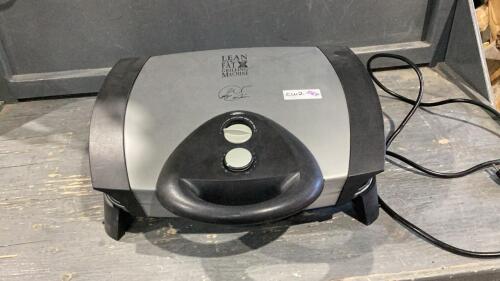 GEORGE FOREMAN GRILLING MACHINE