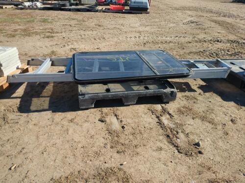 Trailer Window and Aluminum Ladder