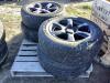 (4) 235/65R18 - MOTOMASTER TIRES W/ 5-BOLT RIMS - 2