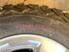 (4) LT265/70R17 - BFGOODRICH TIRES W/ 8-BOLT RIMS + WHEEL CAPS