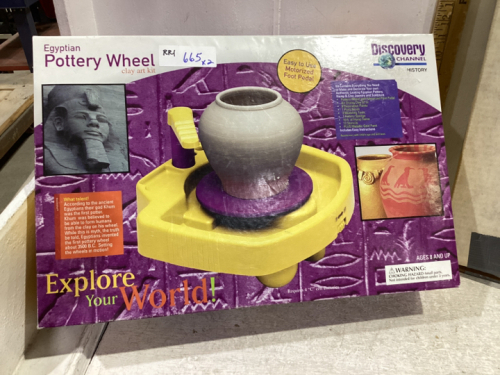 POTTERY WHEEL AND BRASS AND GLASS TABLE