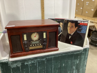 COMBINATION RECORD PLAYER/CD/RADIO AND A BOX OF RECORDS