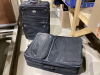 2 WELL USED BLACK SUITCASES