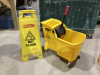 MOP BUCKET AND WET FLOOR SIGN