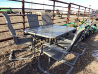 Glass top patio table with 6 arm chairs