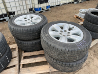 Four Goodyear tires on GM rims