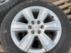 Four Goodyear tires on GM rims - 3