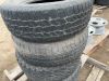 Four mismatched 16 inch truck tires - 4