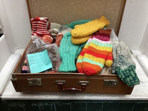 SUITCASE W/HAND KNITTED MITTENS,LINERS