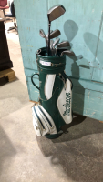 VINTAGE GOLF BAG WITH SOME CLUBS