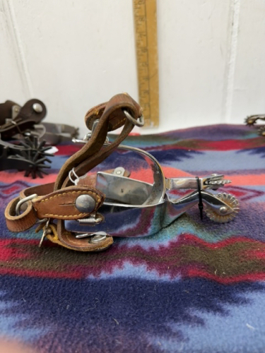 Set of stainless steel spurs with working straps