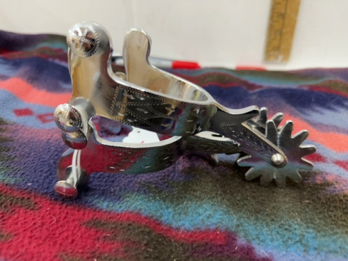 Engraved stainless steel spurs