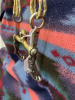 Hand. Braided rawhide bridle with long shank spade bit. - 5