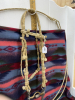 Hand, braided rawhide bridal with reins, and Longshank cricket bit - 2