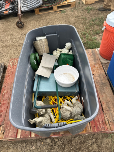 Tub of miscellaneous yard supply