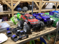 SHELF #4: RC TRUCKS, EVIDENCE KIT, KIDS TALKING TOY