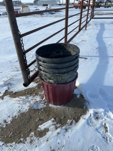 Five plastic barrels