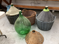 3 LARGE ROUNDED GREEN CARBOYS IN BASKETS