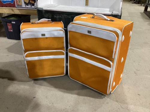 2 ORANGE SUITCASES