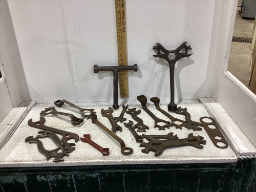 BOX OF ANTIQUE IMPLEMENT WRENCHES