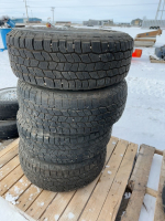 4 COOPER TIRES ON NISSAN PATHFINDER RIMS