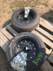 Two new mower tires on rims