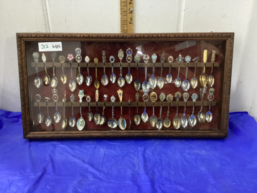 COLLECTOR SPOONS IN DISPLAY