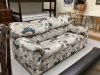 MULTI COLOURED FABRIC LOVE SEAT HIDE-A-BED