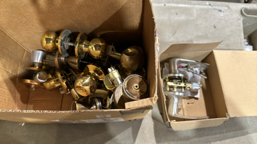 Box of used door knobs