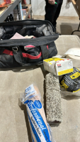 Bag of paint and drywall supplies