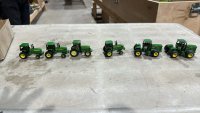 Six John Deere Miniature Tractors