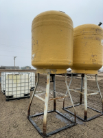 Fibreglass tank with valve on steel stand