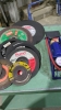 Box of cutting wheels and bicycle pump