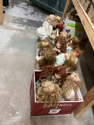 4 BOXES OF PORCELAIN, CLOTH + WOOD DOLLS