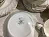 BIN W/ HORSESHOE RACK & LARGE SET OF DISHES - 5