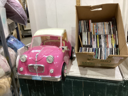 BOX OF CD’S & CONVERTIBLE PINK CAR