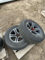 Two Trailier tires on black Sendel aluminum rims