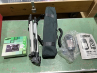 Samsung digital camera with tripod and Bushnell GPS receiver