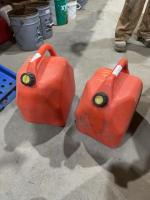 Two plastic jerry cans