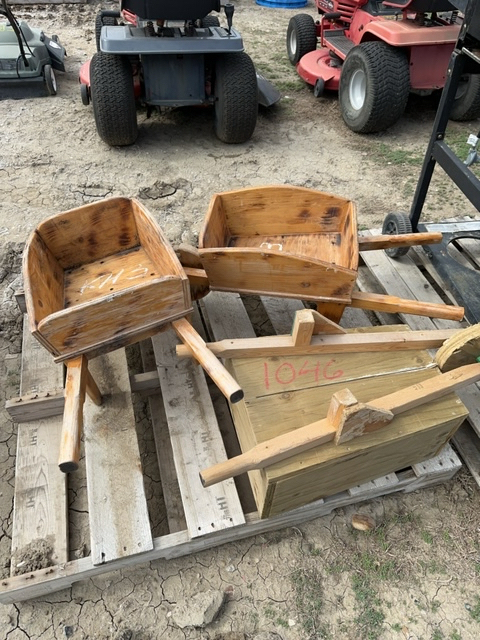 Three wheelbarrow planters