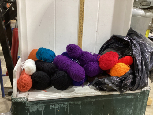 GARBAGE FULL OF ASSORTED YARN