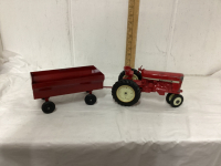 VINTAGE METAL INTERNATIONAL TOY TRACTOR WITH WAGON