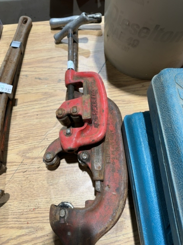 Two pipe cutters, large one is rigid