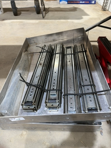 Three aluminum sliding drawers with glides