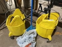 Two rolling mop, buckets, and mop