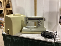 PORTABLE KENMORE SEWING MACHINE