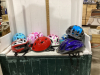 LARGE AMOUNT OF BIKE HELMETS